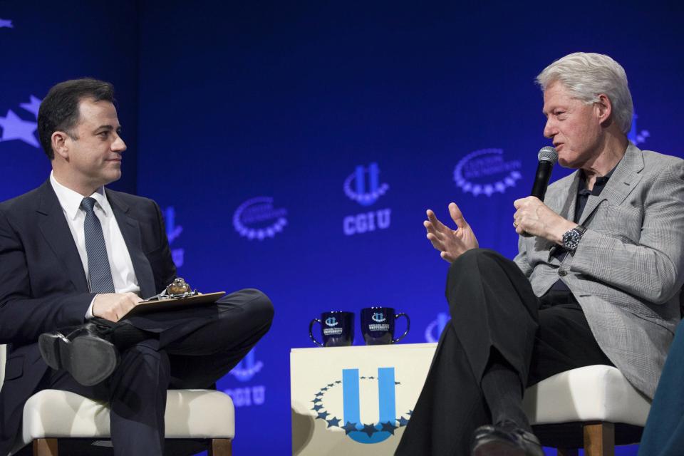 Comedian Jimmy Kimmel (L) and former President Bill Clinton discuss how technology has enabled change within the world during the closing plenary session on the second day of the 2014 Meeting of Clinton Global Initiative University at Arizona State University in Tempe March 22, 2014. REUTERS/Samantha Sais (UNITED STATES - Tags: POLITICS SCIENCE TECHNOLOGY)