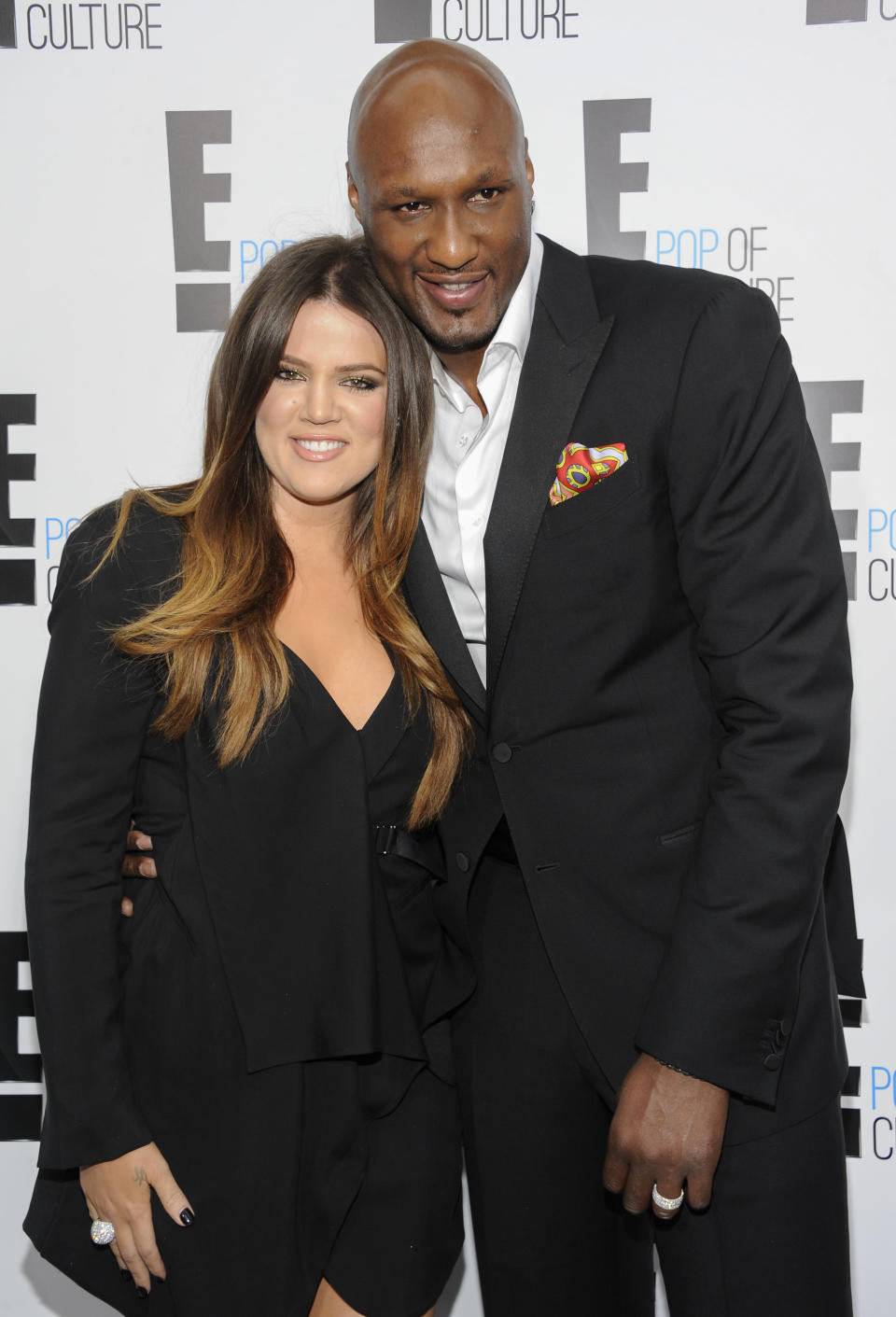 FILE - This April 30, 2012 file photo shows TV personality Khloe Kardashian Odom and professional basketball player Lamar Odom from the show "Keeping Up With The Kardashians" at an E! Network upfront event in New York. Kardashian called it quits with the troubled basketball star after four years of marriage and months of endless tabloid headlines juicier than anything we’d seen in their reality show. (AP Photo/Evan Agostini, File)