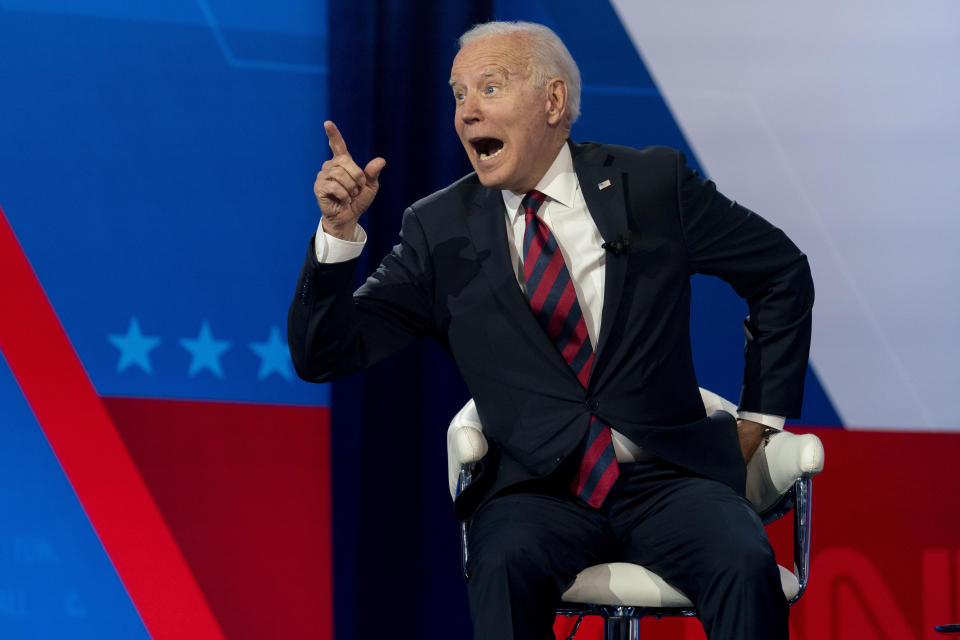 President Joe Biden interacts with members of the audience during a commercial break for a CNN town hall at Mount St. Joseph University in Cincinnati, Wednesday, July 21, 2021. (AP Photo/Andrew Harnik)