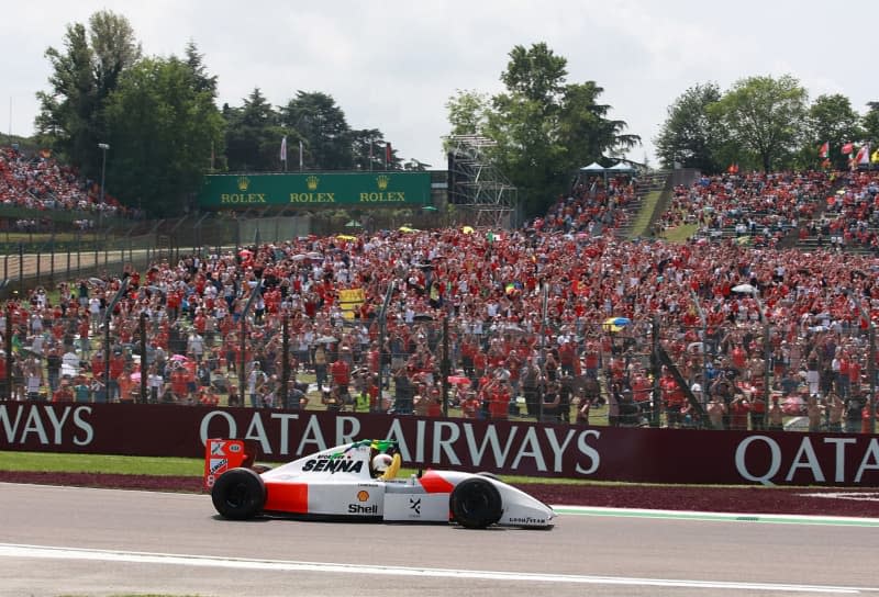 German Formula 1 driver Sebastian Vettel drives four laps of honor in the  the 1993 McLaren car of the late Ayrton Senna, who died 30 years ago in an accident in Imola, during the 2024 Emilia Romagna Grand Prix, at the Autodromo Internazionale Enzo e Dino Ferrari circuit. Hasan Bratic/dpa