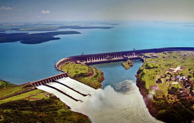 A river is bisected by a concrete dam