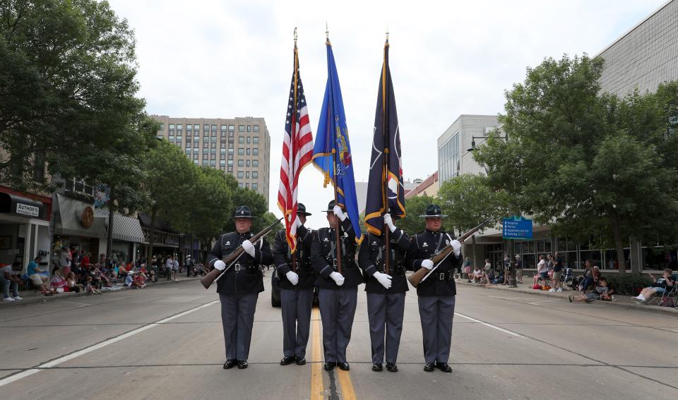 Wisconsin State Patrol members participate in the 72nd Appleton Flag Day Parade on Saturday, June 10, 2023, in Appleton, Wis.