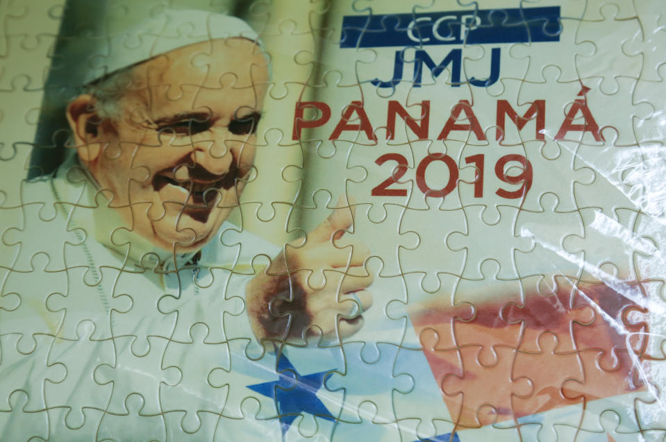 A puzzle with an image of Pope Francis is displayed at one of the workshop where young inmates work, at the Las Garzas de Pacora detention center, Panama, Wednesday, Jan. 16, 2019. The Argentine pontiff Francis will gather with the young inmates during his visit to Panama. (AP Photo/Arnulfo Franco)