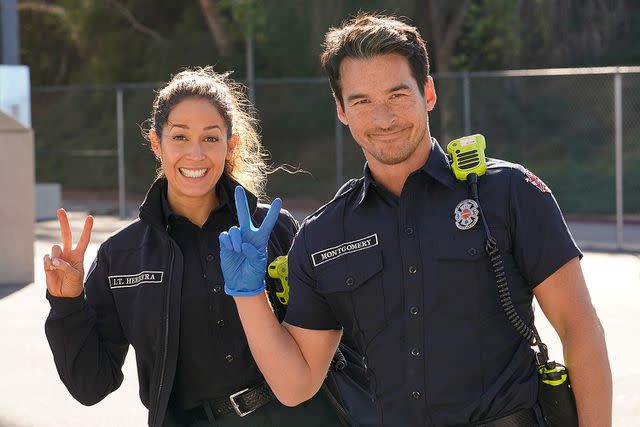 <p>James Clark/ABC via Getty</p> Jaina Lee Ortiz photographed with Jay Hayden on the set of 'Station 19'.