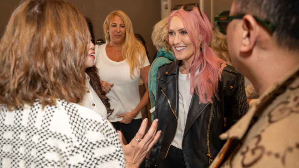 Alex Hirschi ("Supercar Blondie")mingles with attendees at Robb Report's House of Robb at the Carmel Valley Ranch on August 17.