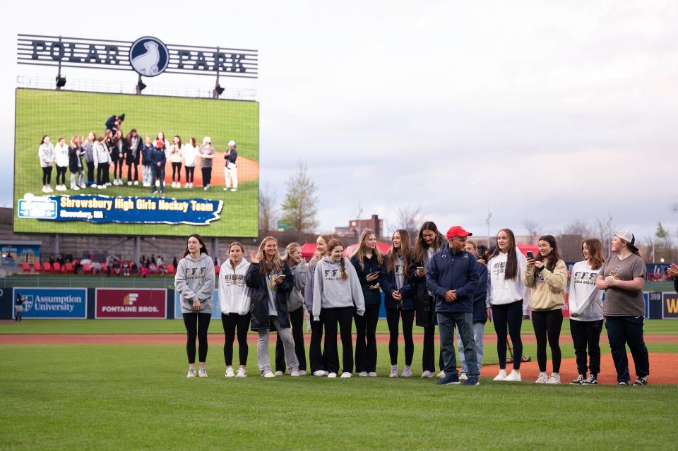 The Shrewsbury girls' hockey team takes the field at Polar Park on Wednesday April 26, 2023.