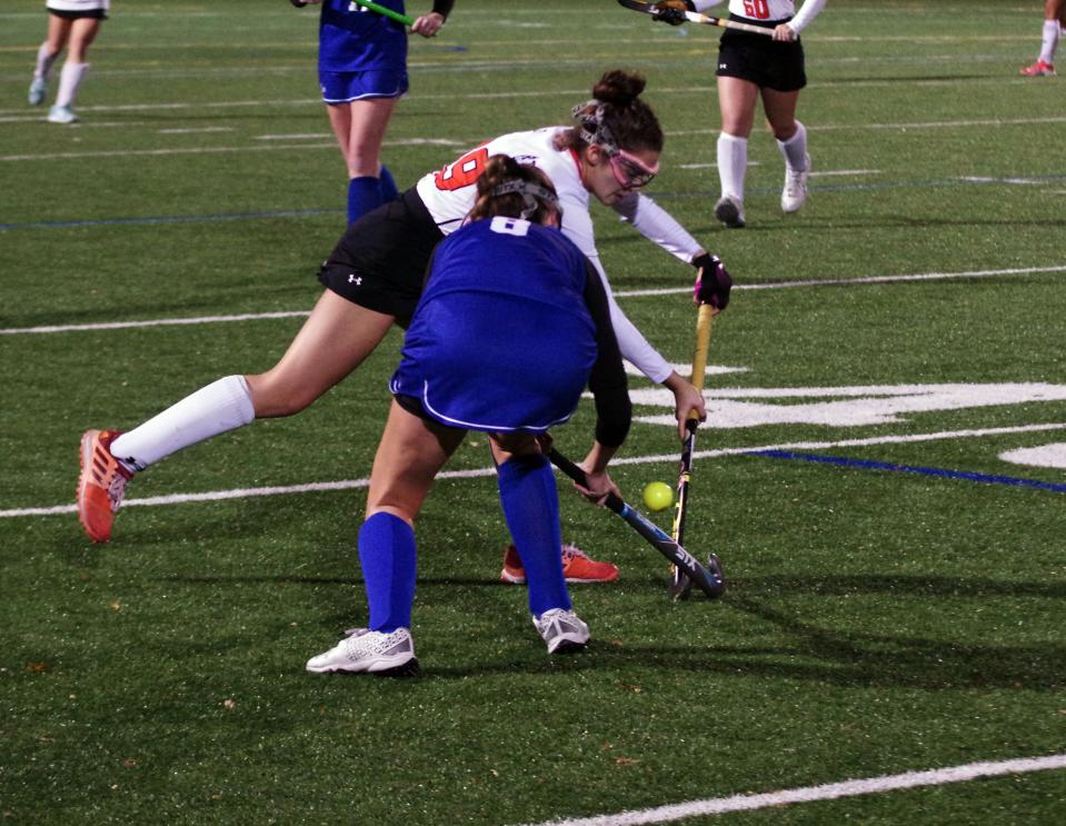 Thursday, Nov. 4, 2021 -- While up 1-0, Scituate Sailor (#8) Courtney Ruble tries to keep the ball in the Tiger zone but is met by (#39) Lily Gaskill of OA who looks to clear the ball.