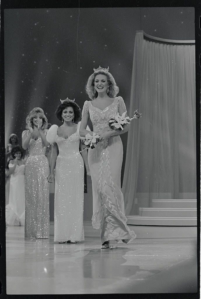 <p>With big hair and this beaded dress, Sharlene Wells from Utah was an '80s dream when she took her victory lap across the stage. </p>