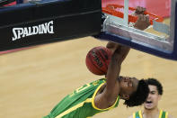 Oregon's Eric Williams Jr. (50) dunks during the first half of a second-round game against Iowa in the NCAA men's college basketball tournament at Bankers Life Fieldhouse, Monday, March 22, 2021, in Indianapolis. (AP Photo/Darron Cummings)