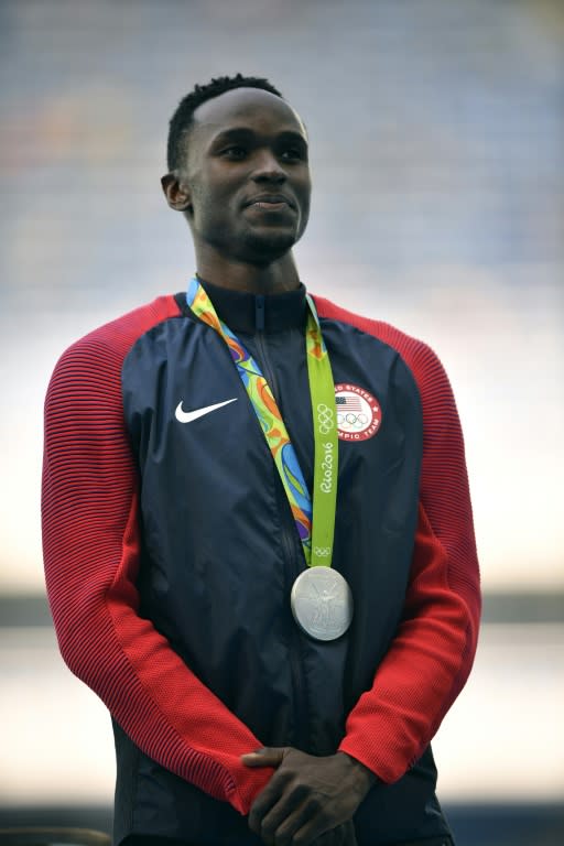 Will Claye celebrated his silver by going down on one knee to propose to his fiancee