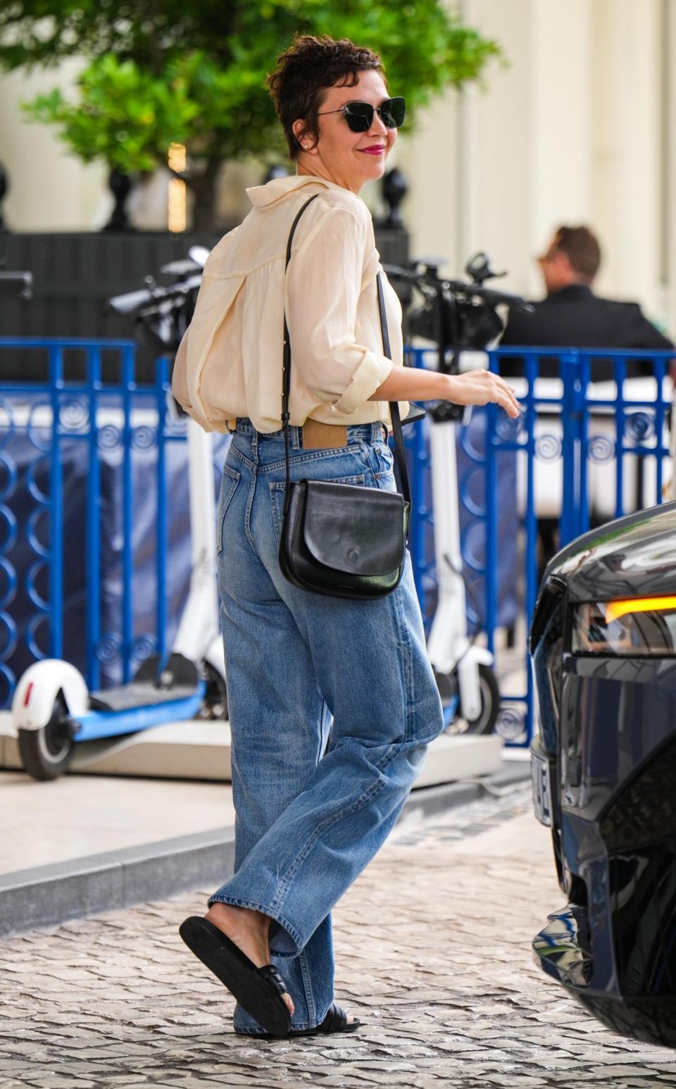 Maggie Gyllenhaal is seen in a casual shopping style at the 75th annual Cannes Film Festival