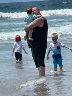 Freedy and three of his five kids spend time at the beach during a trip to San Diego, California.