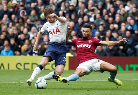 Soccer Football - Premier League - Tottenham Hotspur v West Ham United - Tottenham Hotspur Stadium, London, Britain - April 27, 2019 West Ham's Ryan Fredericks blocks a shot from Tottenham's Ben Davies REUTERS/David Klein