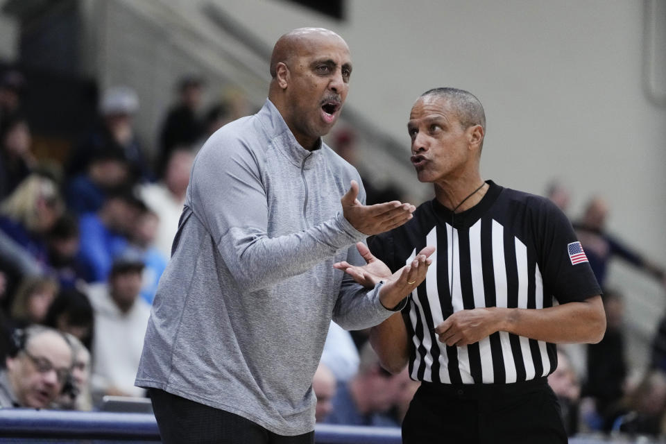 Pepperdine head coach Lorenzo Romar reacts while speaking with a referee during the first half of the team's NCAA college basketball game against Saint Mary's on Thursday, Feb. 29, 2024, in Malibu, Calif. (AP Photo/Ryan Sun)