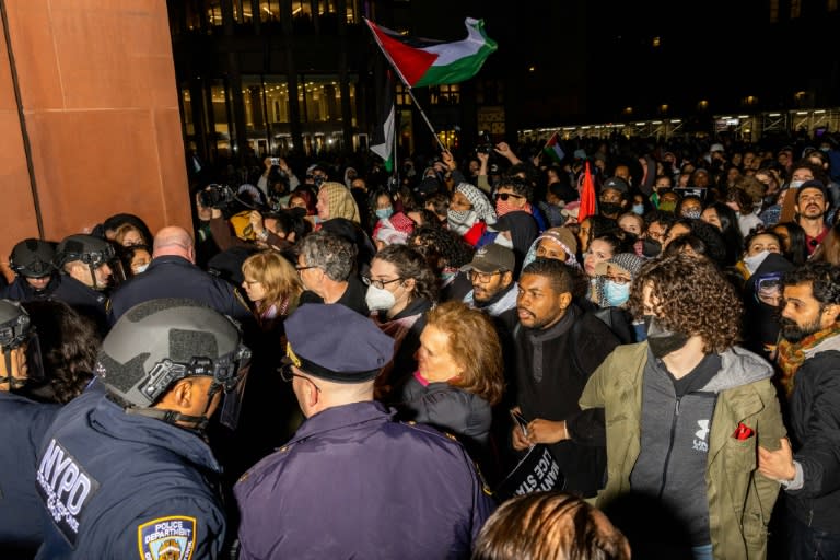 New York Police Department officers detain pro-Palestinian students and protesters who had set up an encampment on the campus of New York University to protest the Israel-Hamas war (Alex Kent)