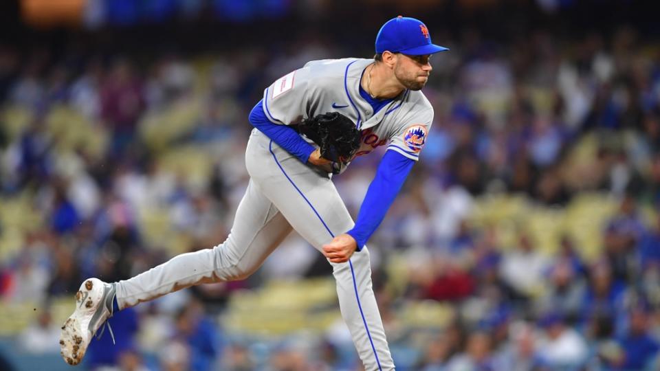 Apr 17, 2023;  Los Angeles, California, USA;  New York Mets starting pitcher David Peterson (23) throws against the Los Angeles Dodgers during the first inning at Dodger Stadium.  Mandatory Credit: Gary A. Vasquez-USA TODAY Sports