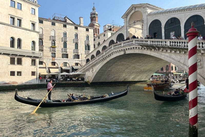 Venice is the first city in the world to charge admission: If you want to visit, you have to pay first, as part of an effort to limit the effects of mass tourism. But will €5 make much of a difference to tourists paying €110 for a half-hour gondola ride? Christoph Sator/dpa