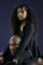 Los Angeles Laker Kobe Bryant stands on the sideline with his daughter Gianna Maria-Onore Bryant on his shoulders prior to the start of the game against the United States and China during an international firendly match at Qualcomm Stadium on April 10, 2014 in San Diego, California. (Photo by Kent C. Horner/Getty Images)