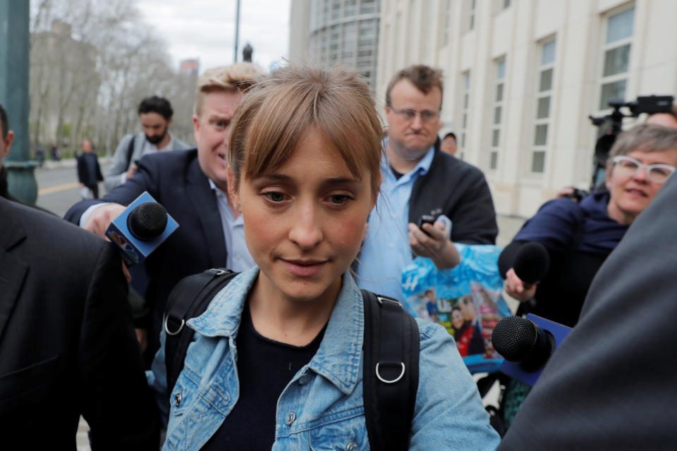 Actress Allison Mack, known for her role in the TV series "Smallville", departs after being granted bail following being charged with sex trafficking and conspiracy in New York, U.S., April 24, 2018.&nbsp;