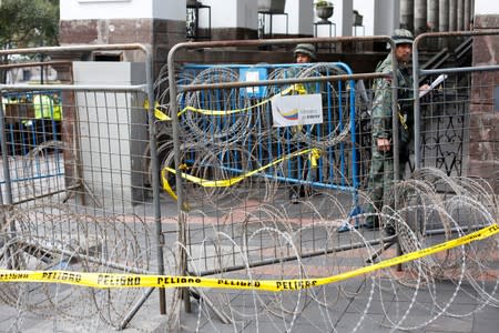 Metal fencing and razor wires block the entrance to the presidential palace after Ecuador's President Lenin Moreno's government ended four-decade-oil fuel subsidies, in Quito