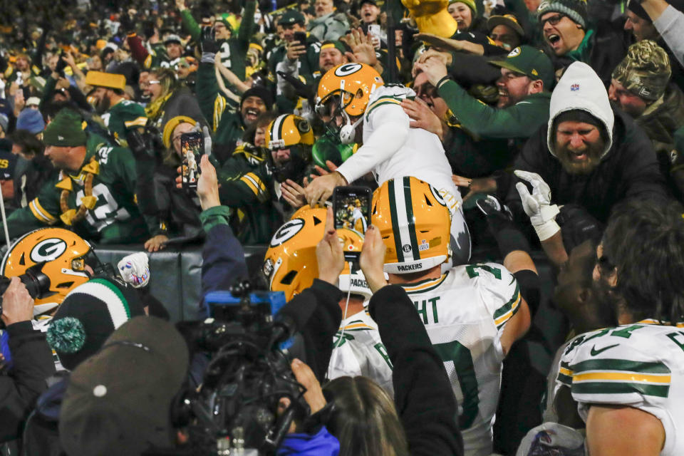 Green Bay Packers kicker Mason Crosby celebrates kicking the game-winning field goal by jumping in the stands following an NFL football game against the Detroit Lions, Monday, Oct. 14, 2019, in Green Bay, Wis. Green Bay won 23-22. (AP Photo/Jeffrey Phelps)