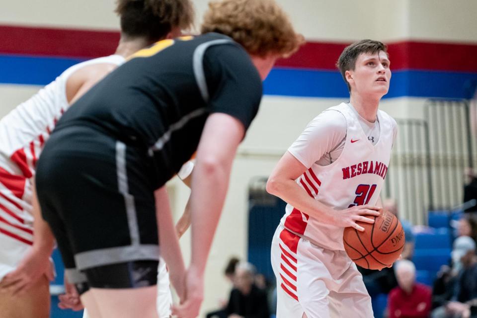 Neshaminy's Sean Curley eyes the basket from the free throw line in a boys basketball game against Central Bucks West at Neshaminy High School in Langhorne on Friday, January 20, 2023. Neshaminy defeated Central Bucks West 52-38.