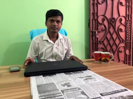 Bangladeshi journalist Azad pictured inside his office in Ukhia Upazila