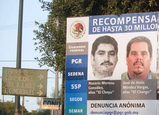 Partial view of a billboard showing pictures of the heads of the La Familia drug cartel in Morelia, Mexico. Mexican police have captured the top boss of La Familia cartel, Jose de Jesus Mendez, in a raid on the town of Aguascalientes, a government spokesman said