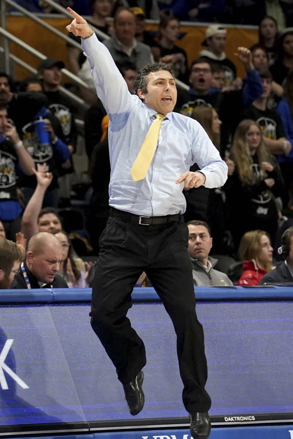 Georgia Tech head coach Josh Pastner calls out to his team as they take on Pittsburgh during the second half of an NCCA college basketball game in Pittsburgh, Tuesday, Feb. 21, 2023. (AP Photo/Matt Freed)