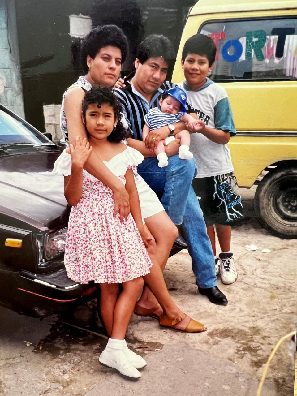 A 1999 picture of Claudia de Mejia and her family in their rural village in Guatemala. From left, Edith, then 11, de Mejia, her husband, Marco, their youngest, Luis, then three months old, and their oldest, also named Marco, then 13