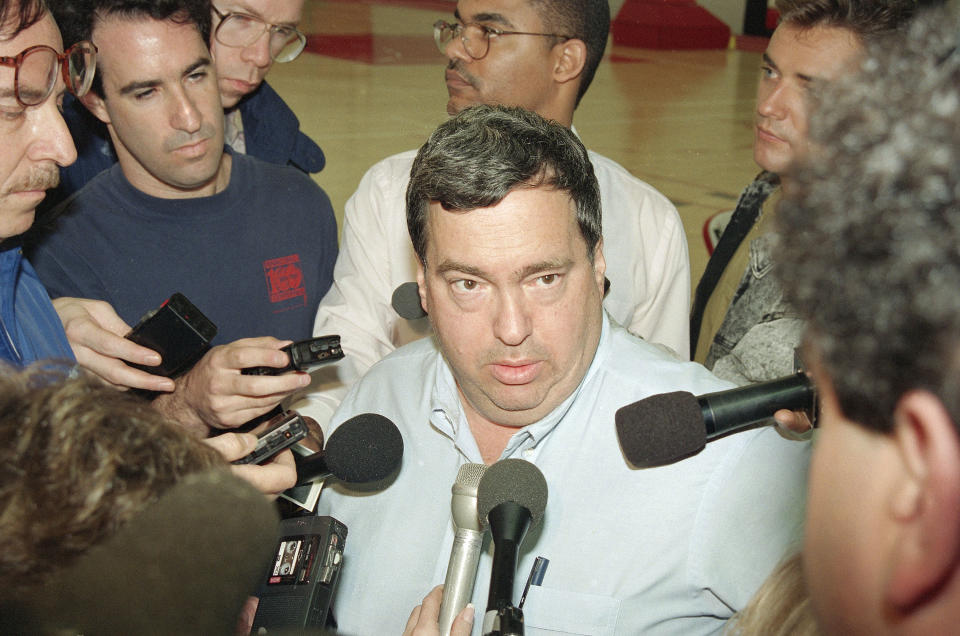 Chicago Bulls' general manager Jerry Krause talks to reporters at the Bulls' practice facility in Deerfield, Ill., June 3, 1993.  Bulls' star Michael Jordan continued his vow of silence with the media despite a new book's claims that he lost over a million dollars in golf bets in 10 days in 1991. Krause also declined to discuss it saying it was a private matter for Jordan.  (AP Photo/Fred Jewell)