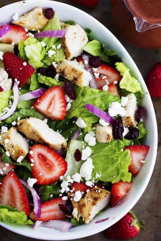 <p>The Recipe Critic</p><p>A mouthwatering salad with fresh strawberries, cranberries, goat cheese and almonds. The strawberry balsamic dressing gives it the perfect flavor and is one amazing summer salad!</p><p><strong>Get the recipe: <a href="https://therecipecritic.com/strawberry-chicken-salad-with-strawberry-balsamic-dressing/" rel="nofollow noopener" target="_blank" data-ylk="slk:Strawberry Chicken Salad with Strawberry Balsamic Dressing;elm:context_link;itc:0;sec:content-canvas" class="link rapid-noclick-resp"><em>Strawberry Chicken Salad with Strawberry Balsamic Dressing</em></a></strong></p>