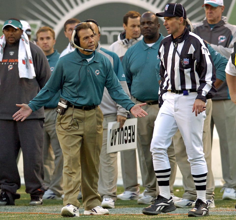 Nick Saban, left, was not happy as Miami Dolphins coach in 2006. (AP)