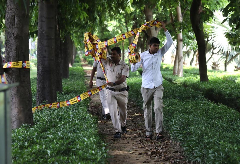 Indian policemen secure the premises around the Canadian embassy in New Delhi (EPA)