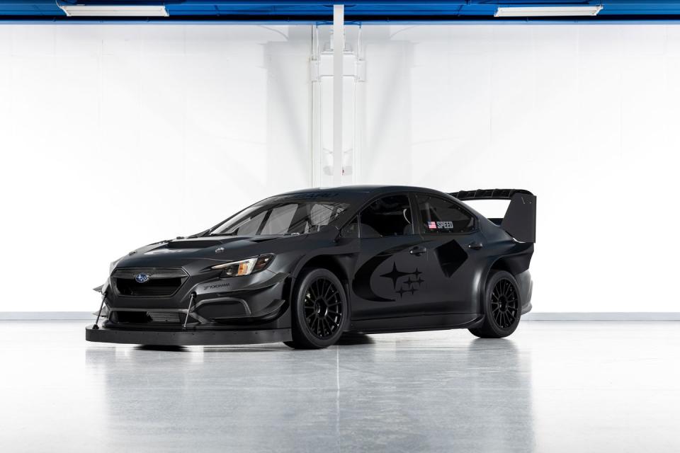 front three quarter of the 2024 project midnight time attack car in black on a white shop background