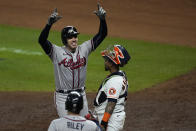 Atlanta Braves' Freddie Freeman celebrates after a home run during the seventh inning in Game 6 of baseball's World Series between the Houston Astros and the Atlanta Braves Tuesday, Nov. 2, 2021, in Houston. (AP Photo/Ashley Landis)