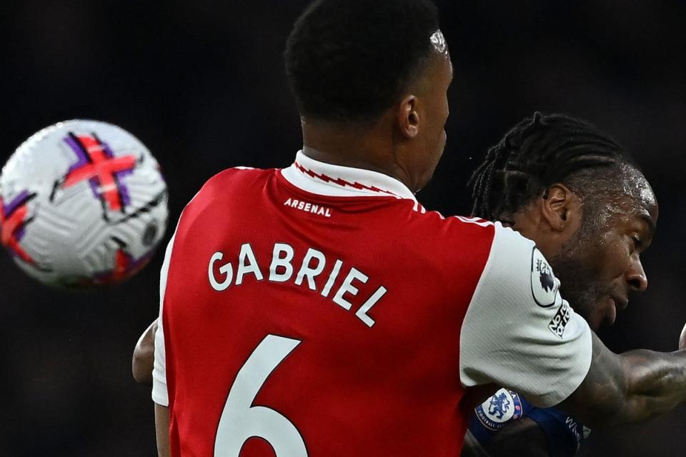 Injury blow: Arsenal defender Gabriel limped off in the win over Chelsea  (AFP via Getty Images)