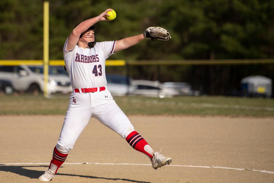 Lincoln-Sudbury junior Lia Mazzocchi fires a pitch to home plate during the game in Sudbury against Holliston, April 13, 2023. 