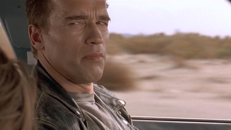 Arnold Schwarzenegger drives a car in the desert in Terminator 2: Judgement Day
