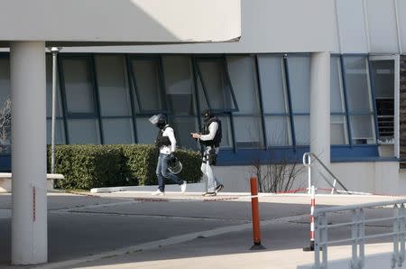 Police inside the Tocqueville high school after a shooting in Grasse, southern France, March 16, 2017. REUTERS/Eric Gaillard