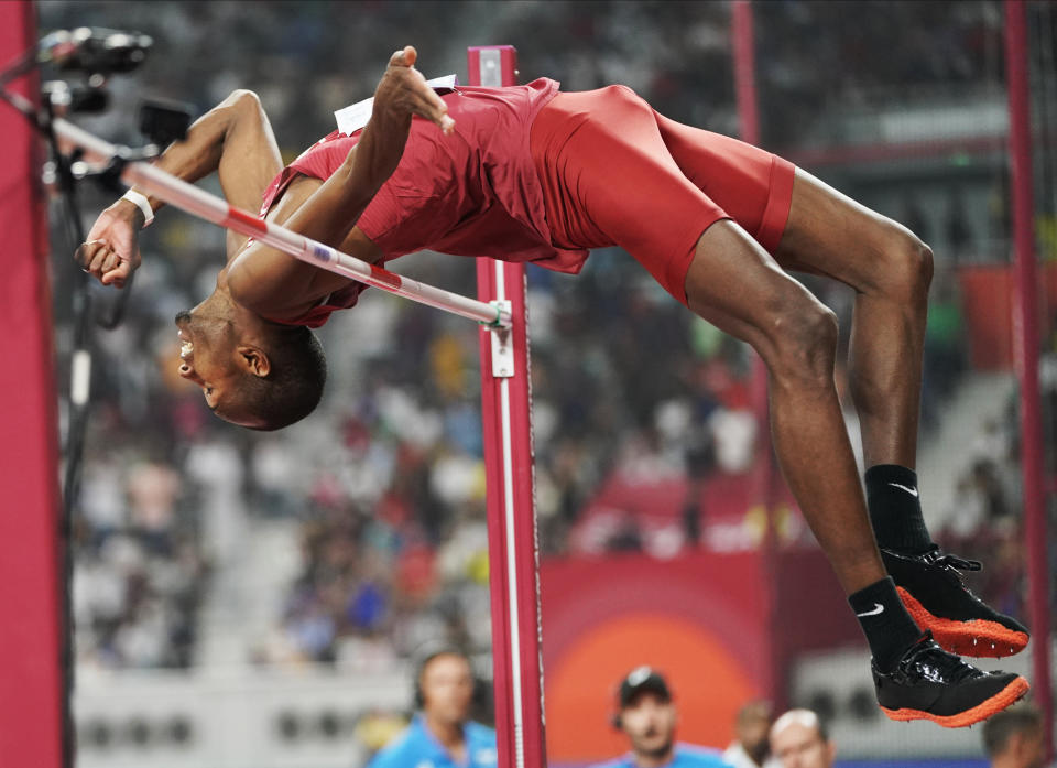 Gold medalist Mutaz Essa Barshim, of Qatar, competes in the men's high jump final at the World Athletics Championships in Doha, Qatar, Friday, Oct. 4, 2019. Barshim won the gold medal. (AP Photo/David J. Phillip)