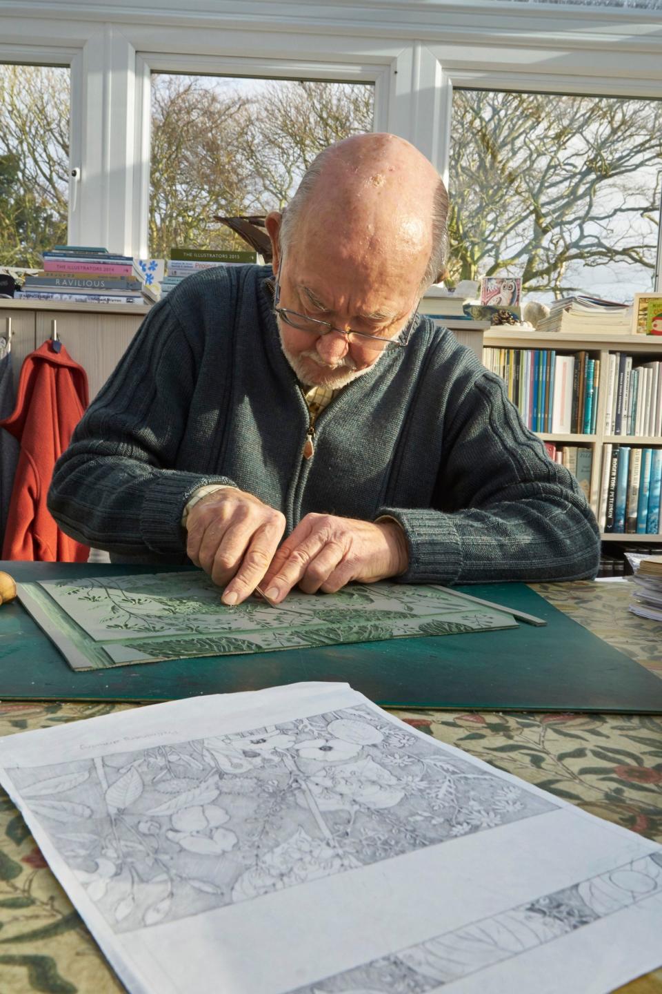 Cutting lino for his book Alien Plants - Tony Buckingham