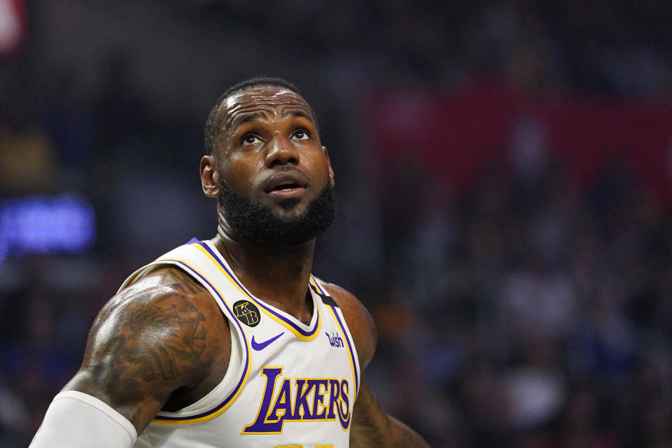 Los Angeles Lakers forward LeBron James watches for a rebound during the first half of an NBA basketball game against the Los Angeles Clippers Sunday, March 8, 2020, in Los Angeles. (AP Photo/Mark J. Terrill)