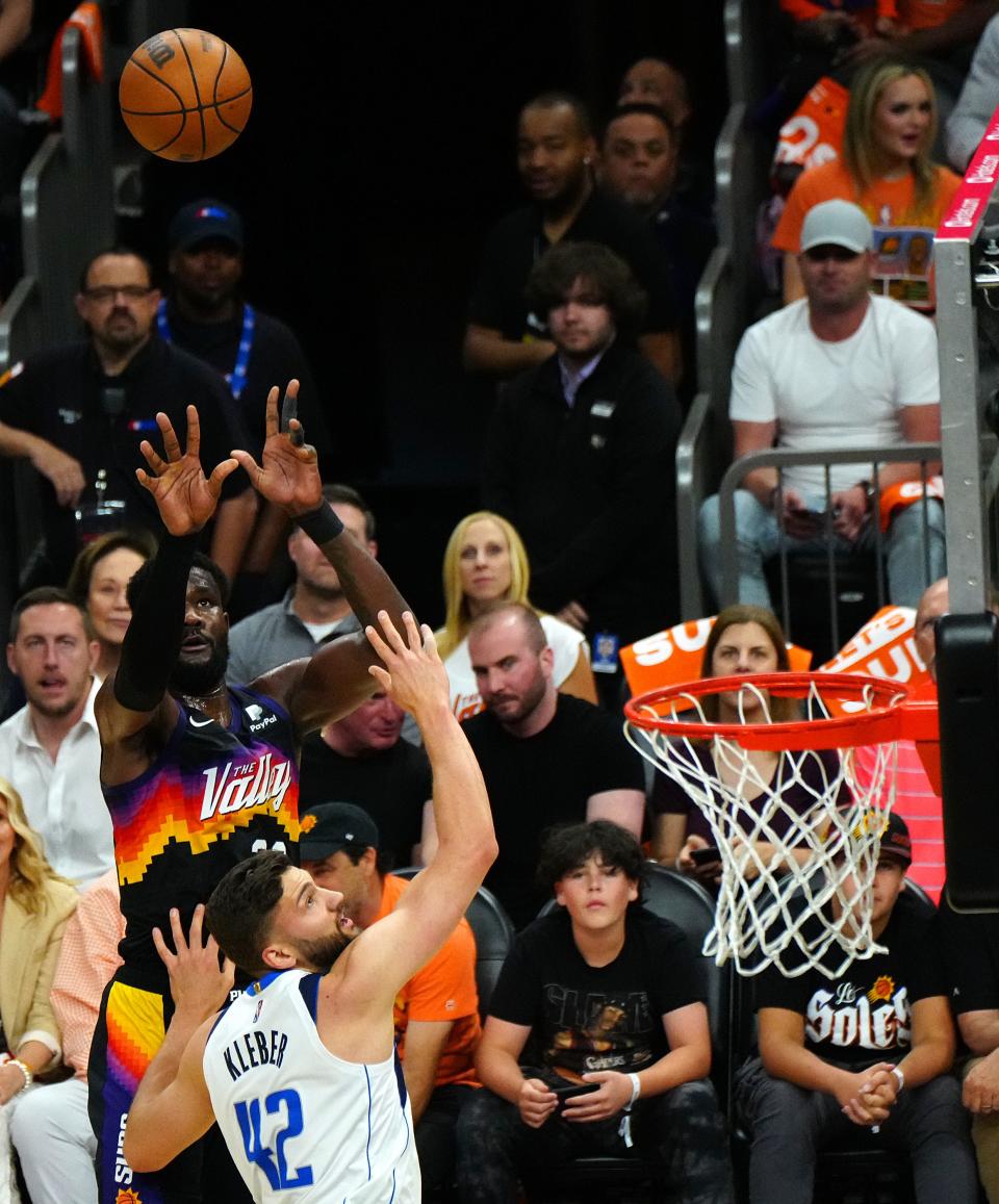 May 4, 2022; Phoenix, Arizona; USA; Suns' Deandre Ayton (22) shoots against Mavericks' Maxi Kleber (42) during the first half of Game 2 in the second round of the Western Conference Playoffs.