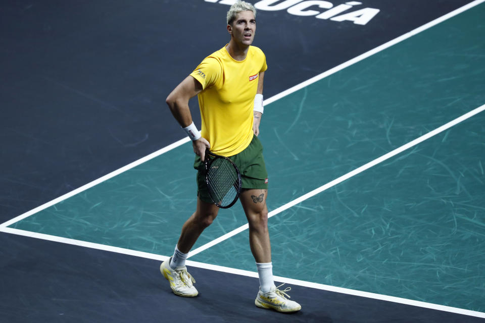 Australia's Thanasi Kokkinakis reacts as he plays Canada's Denis Shapovalov during the final Davis Cup tennis match between Australia and Canada in Malaga, Spain, Sunday, Nov. 27, 2022. (AP Photo/Joan Monfort)