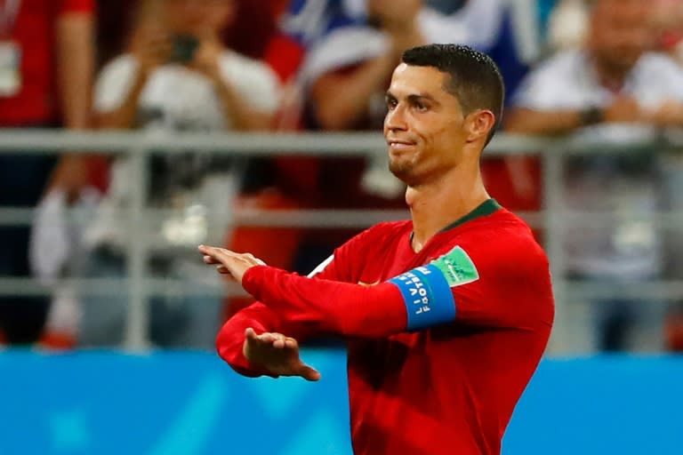 Cristiano Ronaldo missed a penalty and was lucky not to be sent off after catching an Iran defender with an elbow