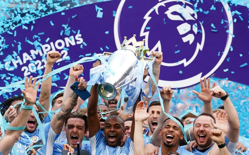 Manchester City's former captain Fernandinho lifts the Premier League trophy last season - Martin Rickett/PA Wire