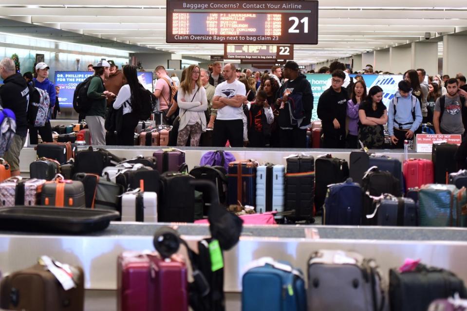 ORLANDO, FLORIDA, UNITED STATES - DECEMBER 28: Unclaimed luggage piles up at baggage carousels during the busy Christmas holiday season at Orlando International Airport on December 28, 2022 in Orlando, Florida. The holiday travel period has been plagued by a winter storm and thousands of delayed and cancelled flights, the majority of which have occurred at Southwest Airlines. (Photo by Paul Hennessy/Anadolu Agency via Getty Images)