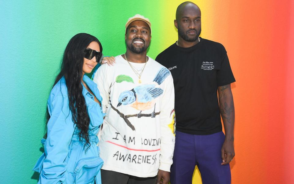 Kim Kardashian and Kanye West with Virgil Abloh at his first show for Louis Vuitton in 2019 - Getty Images