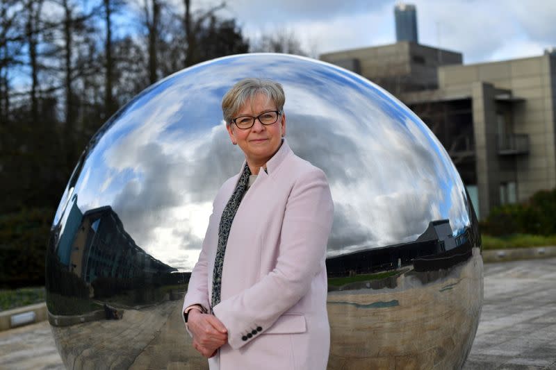 Sharon Peacock, who heads COVID-19 Genomics UK, poses for a portrait in Cambridge